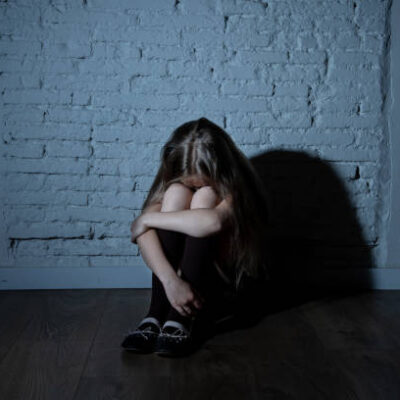 Sad desperate young girl suffering from bulling and harassment at school