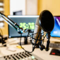 Microphone and mixer at the radio station studio broadcasting news