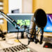 Microphone and mixer at the radio station studio broadcasting news
