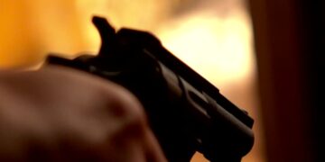 Gun shooting, slow motion