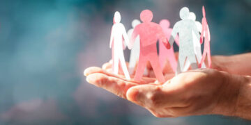 Paper chain friends, teamwork, diversity, family or business community, hand holding and protecting