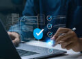 Business performance checklist, Businessman using laptop online survey filling out check digital form task, business performance monitoring and evaluation. online survey question form. online exam.