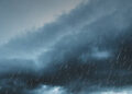raining season. summer storm, dark sky cloudy heavy rain with thunder strike, weather in rainy season