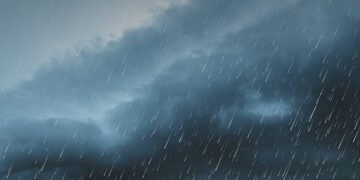 raining season. summer storm, dark sky cloudy heavy rain with thunder strike, weather in rainy season