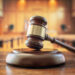 Judges gavel in court room legal trial and law background